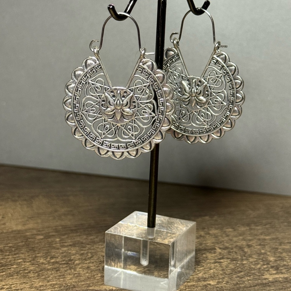 Silver-tone Dangle Earrings with Intricate Design